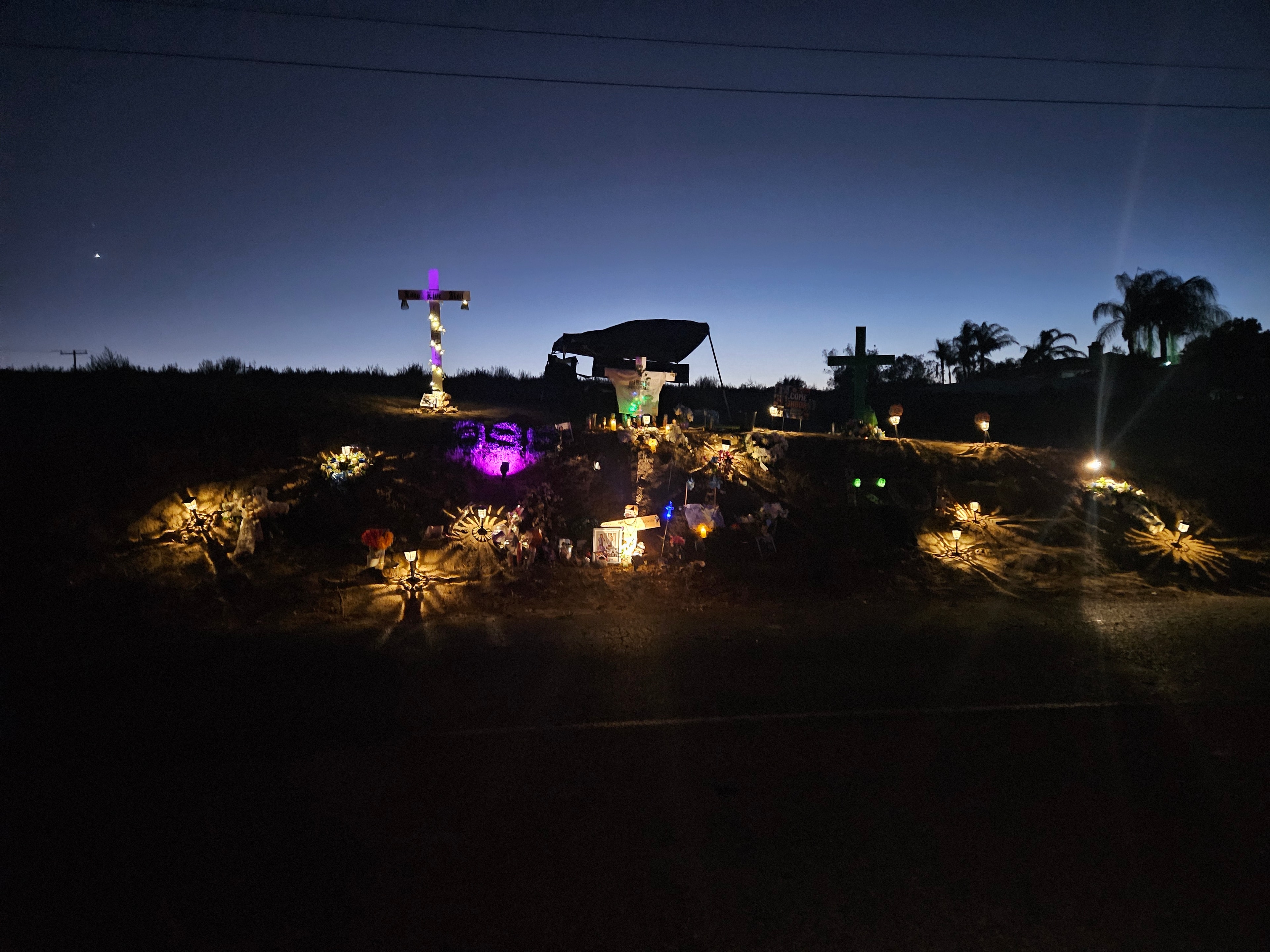 Memorial for Koa — candles, flowers, and tributes